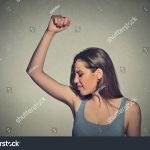 stock-photo-closeup-portrait-young-woman-smelling-sniffing-her-wet-armpit-something-stinks-very-bad-foul-302739851